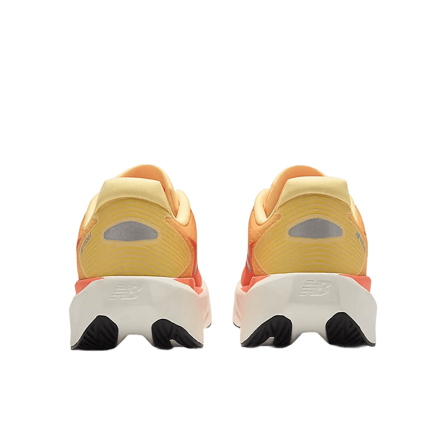 New Balance Women's FuelCell Rebel v5 – Tangerine Heat with Silver Metallic - Interval Running