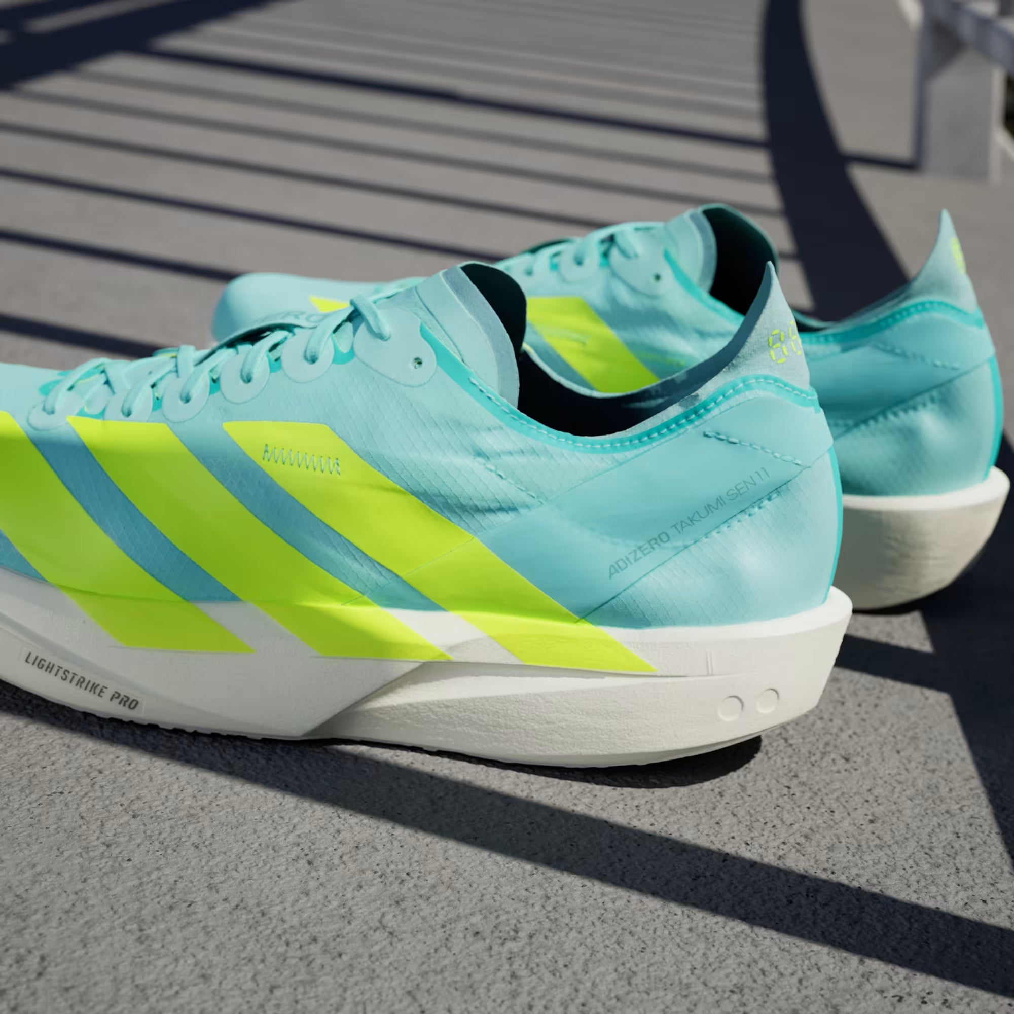 Adidas Men's Adizero Takumi Sen 11 - Flash Aqua / Zero Metalic / Mint Ton