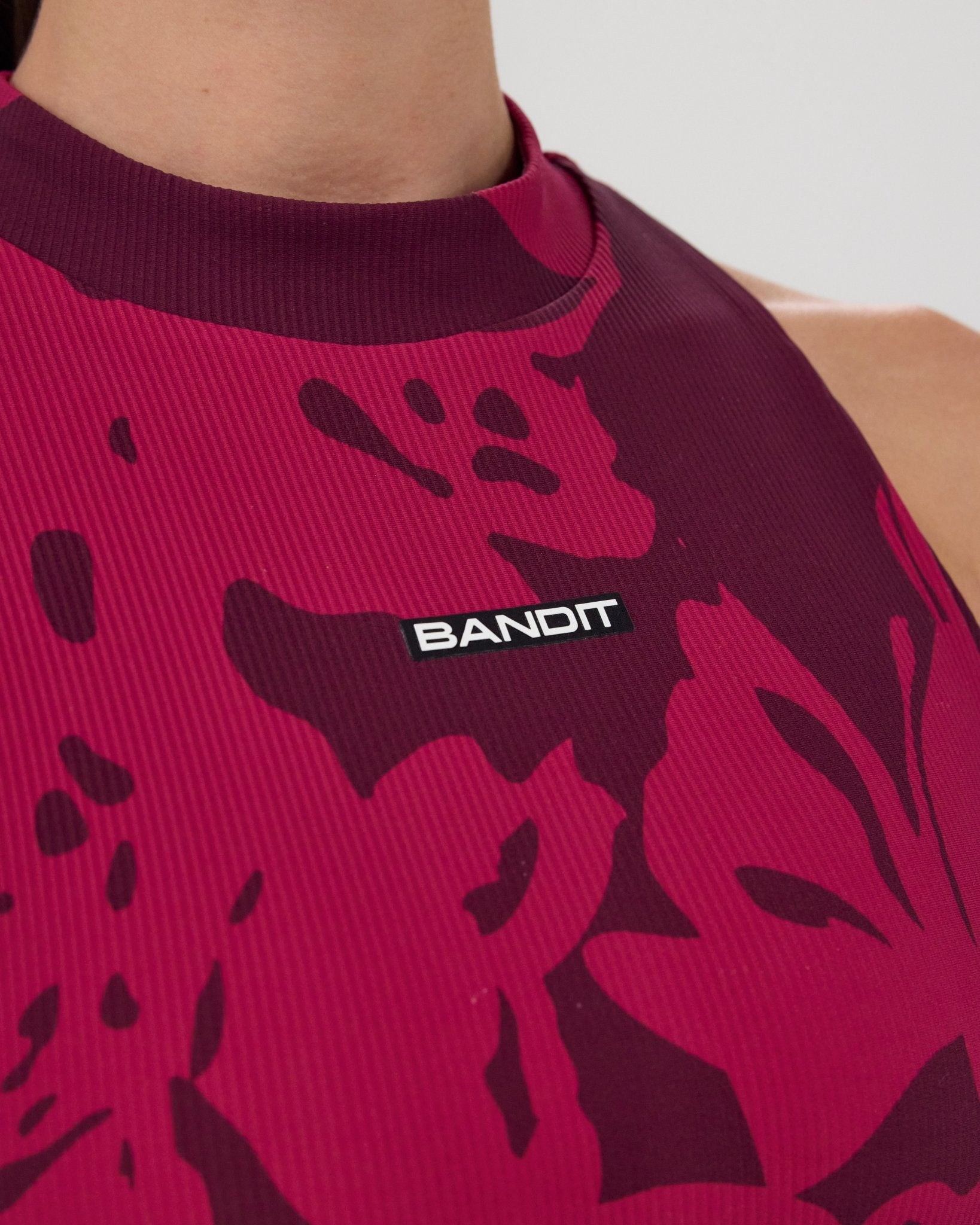 Bandit Cadence™ Mockneck Race Crop - Fig with Berry Abstract Floral - Interval Running
