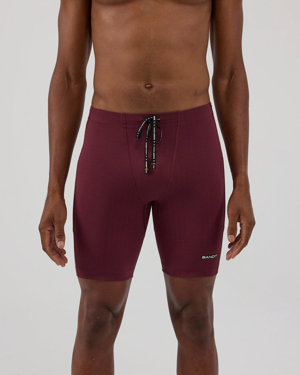 Bandit Gridlock™ 7 Pocket Half Tights - Fig - Interval Running