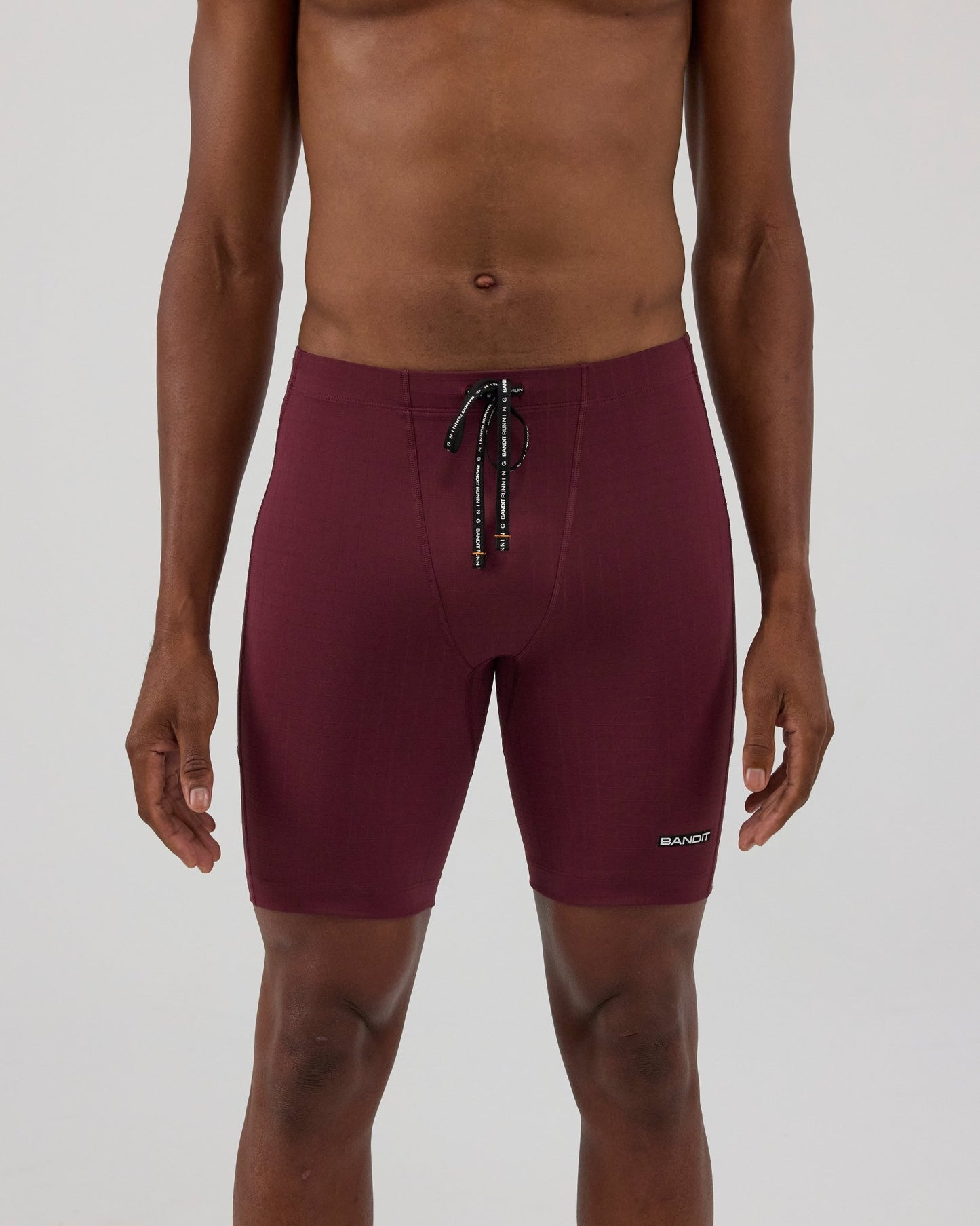 Bandit Gridlock™ 7 Pocket Half Tights - Fig - Interval Running