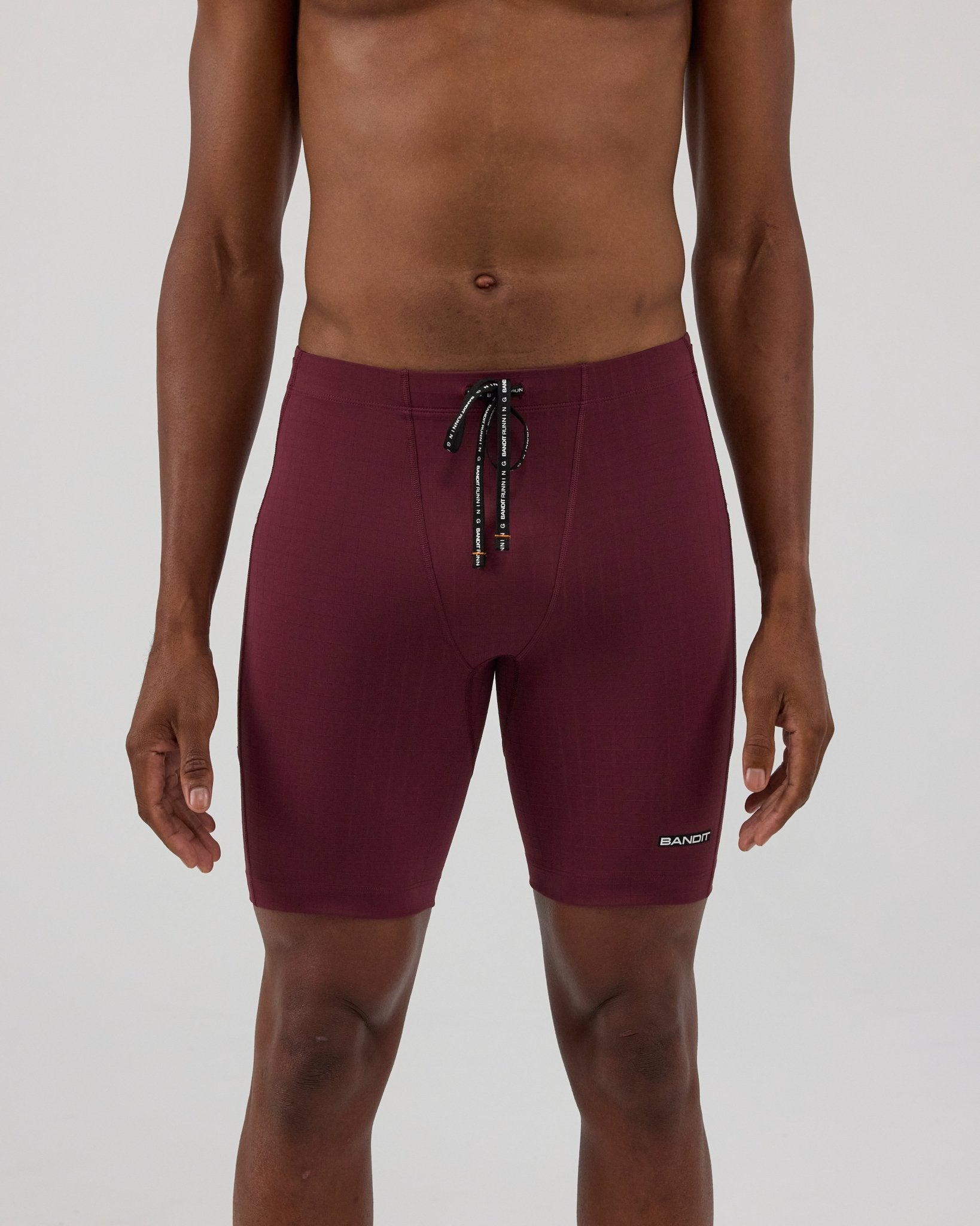 Bandit Gridlock™ 7 Pocket Half Tights - Fig - Interval Running